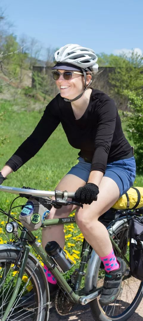 Women biking on Bruce Vento Trail in St. Paul