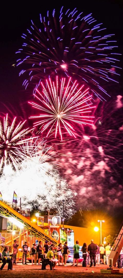 Night falls over the Pennington County Fair